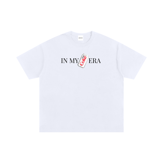 Minimal graphic T-shirt featuring a Diet Coke can printed on the front, styled as clean pop culture streetwear.