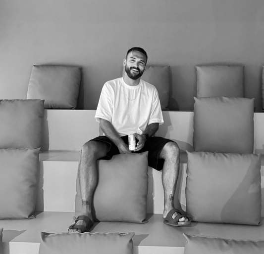 From behind the chair...