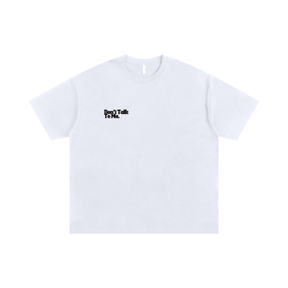 White minimalist T-shirt with small “Don’t Talk To Me” text printed on the chest