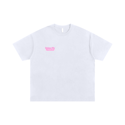White minimalist T-shirt with small pink “Delete My Number” text on the chest