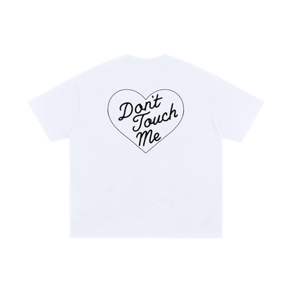 White don’t touch me graphic t-shirt worn from back with heart text design