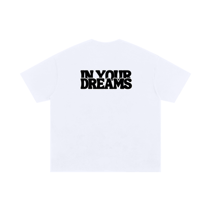 White graphic T-shirt with bold “In Your Dreams” text printed across the back