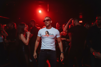 Guy with edgy sunglasses in crowded red-lit club with flash photography wearing Baby Gorgeous tee