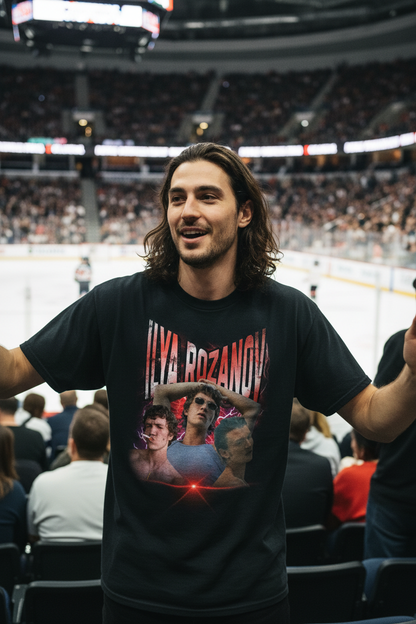 Hot guy with long hair at ice hockey game wearing Ilya Rozanov Heated Rivalry tee